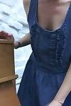 Voyeur shots of cutie in dress bending over to show cleavage