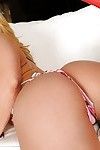 Full-figured mature blonde Austin Taylor slipping off her tiny bikini
