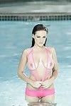 Huge tit brunette undressing her bikini in the pool