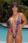 Sexy latina strips off bikini and shows her booming curves in the pool