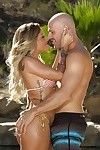Blonde pornstar Abigail Mac giving blowjob to massive cock outdoors