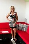 Tiny tits milf Carrie is undressing her sexy skirt and showing her pussy