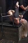 Hot blonde MILF Holly Heart taking painful electroshock on thighs and tits