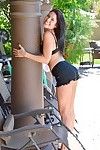 Sexy brunette bombshell strips by the pool and rides on a dildo