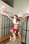 Naughty cheerleader Chastity Lynn revealing her tiny titties and shaved pussy