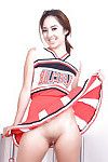 Asian amateur Mila Jade exposing smooth pussy underneath cheerleader outfit