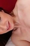 Masturbating Chelsy is masturbating her shaved pussy in close up