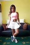 Amateur black MILF Kiki Minaj exposing big natural tits in skirt and socks