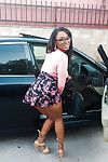 Busty black girl Porsha Carrera bends over in high heels for upskirt