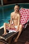 Sexy slim blonde by the pool