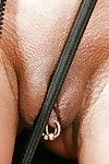 Mature UK femdom pornstar Lady Sarah jerking cock in leather skirt