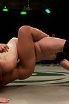 Sexy babes in lesbian wrestling ended with strap-on fucking