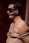 Kinky dominatrix tied up and strap-on fucked slave guy