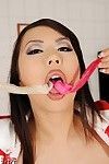 Wet and busty Asian fetish model Tigerr Benson eating cum from condoms