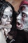 Fetish models Brittany Lynn and Jessie Lee giving head in Zombie threesome