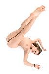 Long legged beauty posing nude