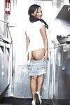 Asian babe Asa Akira drops her denim skirt to reveal her perfect ass