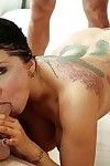 Famous brunette pornstar Romi Rain deepthroating cock during gangbang