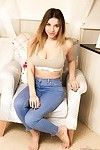 Beauty strips out of her jeans and grey underwear