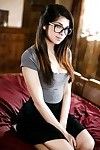 Glasses wearing nerd undressing in bedroom for first time nudes