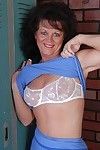 Naughty granny Debella shows off her saggy tits in the changing room