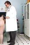 Fatty mature brunette with big tits gets her cunt examed by gyno