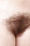 Hirsute mature broad displaying hairy legs and tiny tits in bathtub