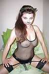 Playful kitty with big tits posing in lingerie and stockings