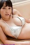 Busty asian yuri posing her natural big tits in silver bikini