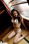 Graceful asian babe Ran Asakawa slipping off her lingerie