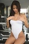 Latina with a hot body teasing in the gym