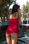 Cute exotic amateur in a red dress