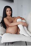 European solo girl Apolonia modeling nude in knee socks for glamour photos