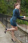 Hot babe naomi outdoors in short dress showing off sexy long nyl