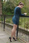 Hot babe naomi outdoors in short dress showing off sexy long nyl
