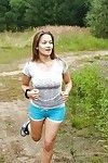 Brunette fitness girl peeling shorts & masturbating with toys outdoors