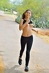 Teen jogger freeing tits from sports bra outdoors before anal fingering