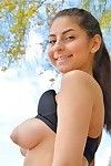 Teen jogger freeing tits from sports bra outdoors before anal fingering