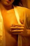 Beauty natalia in the sauna in her sheer white shirt