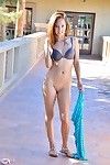 Naughty redhead girl bares her small nipples & lifts long dress in public