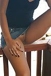 Asian amateur Lily exposing shaved vagina outdoors after upskirt