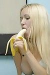 Innocent anne eating a big banana naked