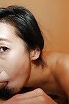 Slippy asian MILF with trimmed pubis has some pussy vibing and fucking fun