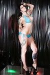 Inked brunette MILF stripper Jordyn Shane shedding bikini on stripper pole