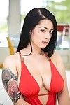 Bikini model with big tits Katrina Jade is showing her sexy tattoos