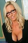 Mature teacher in glasses Emma Starr posing with tits and ass unveiled