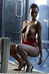 Black glamour model Noel Monique freeing girl parts from red lingerie