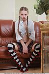 Barely legal schoolgirl Milena D revealing young hairy pussy in long socks