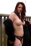 Amateur redhead milf flashers her boobs on a cold november day