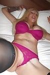 Big busted blonde Candy Manson slipping on her lingerie and stockings